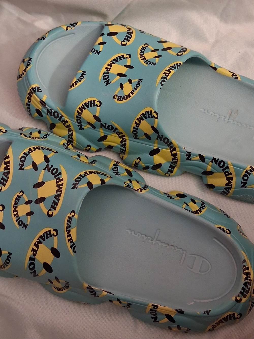 Champion Men's Meloso Squish Smile Slides – Aqua Blue / Yellow Smiley Face